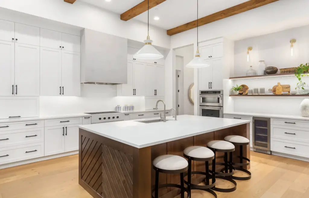 White kitchen with wood accents.